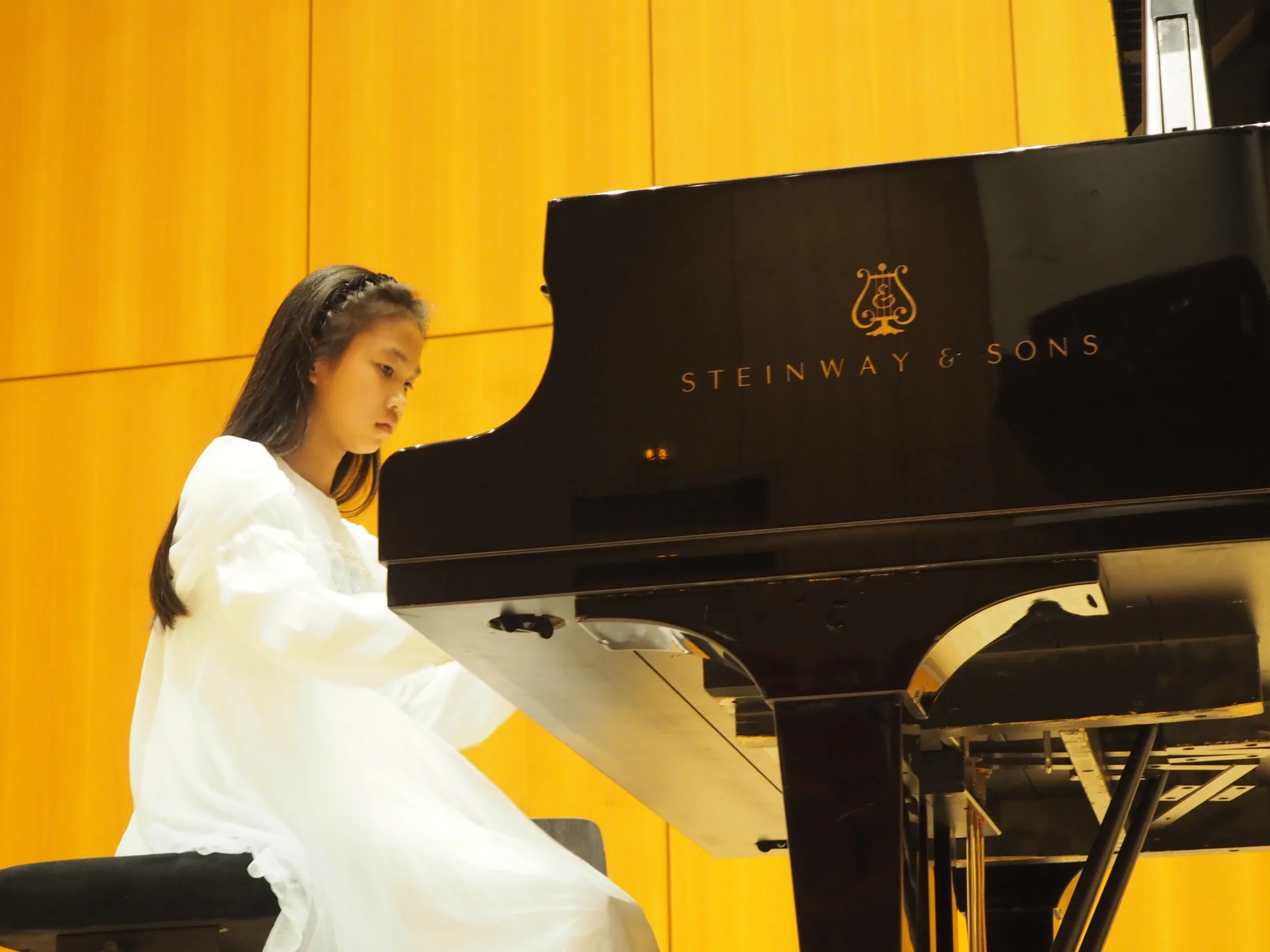 Young pianist performing at the festival